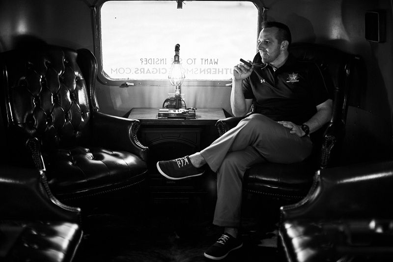 Black and white portrait of owner of Southern Smoke Cigars