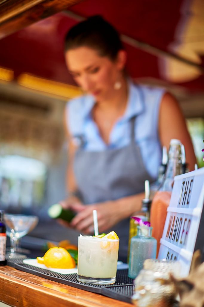 Wander Bar bartender preparing a cocktail