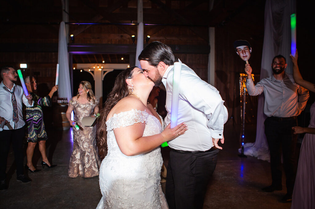 Bride and groom kiss while dancing at their Eden at Gracefield wedding reception - photographed by Charleston wedding photographer Luxe By Lindsay Photography
