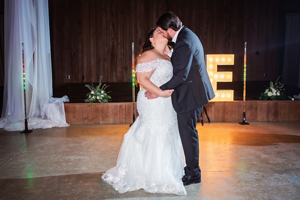 Bride and groom kiss during their private last dance at their Eden at Gracefield wedding reception - photographed by Charleston wedding photographer Luxe By Lindsay Photography